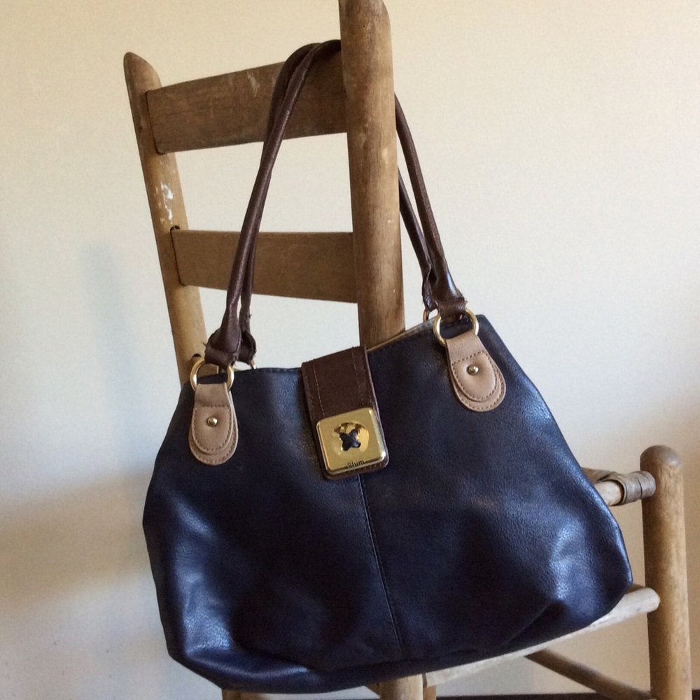 Plum purse in navy.